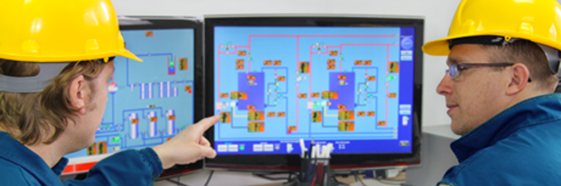 Industrial Workers In Control Room460x163